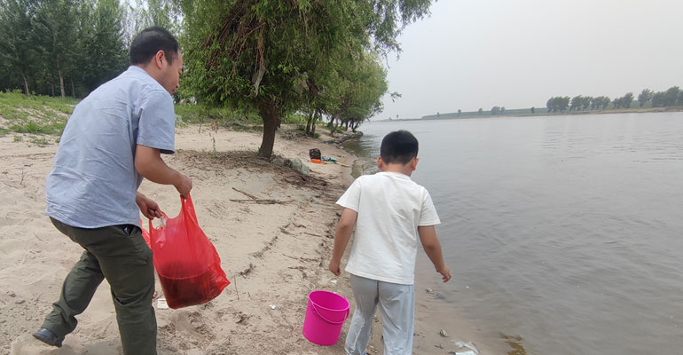 沈阳网站制作公司开展端午放生公益活动